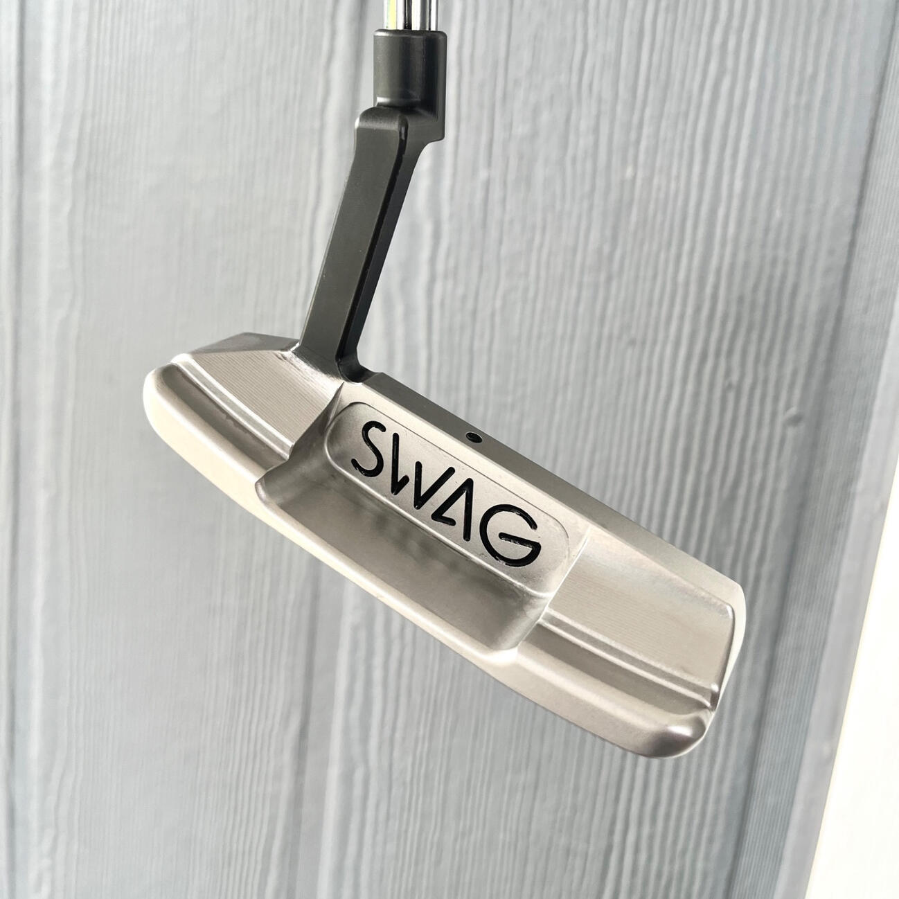One of one SWAG golf putter • Matte stainless, oxidized transition hosel